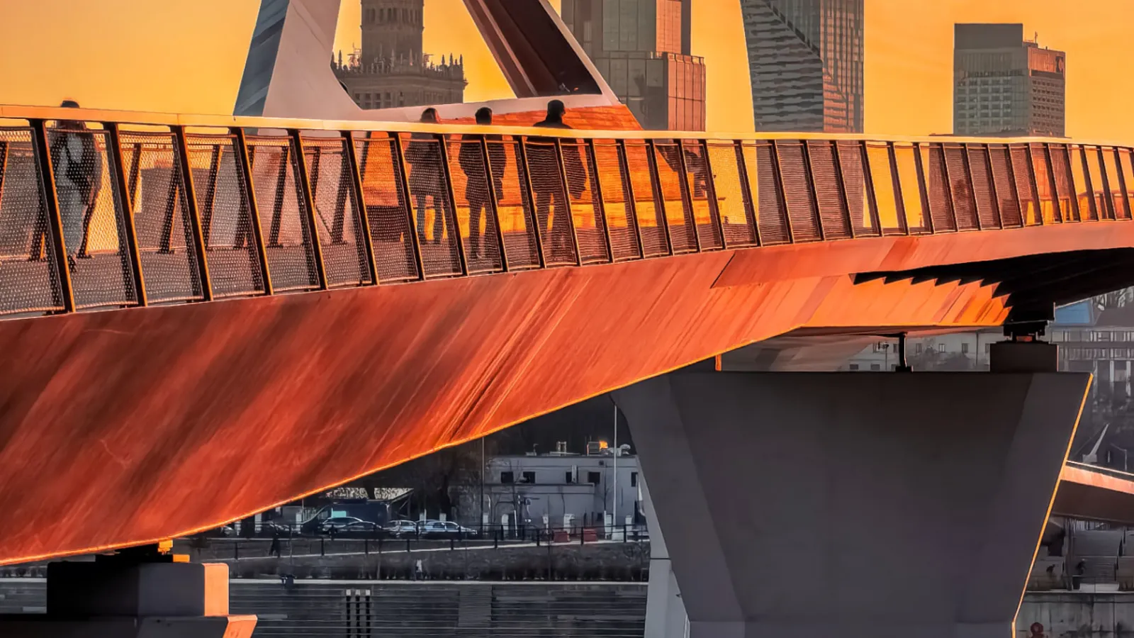 Warsaw skyline and Świętokrzyski Bridge at sunset